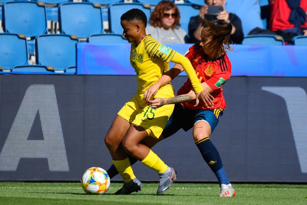 South Africa's midfielder Refiloe Jane (L) vies for the ball with Spain's midfielder Virgina Torrecilla 