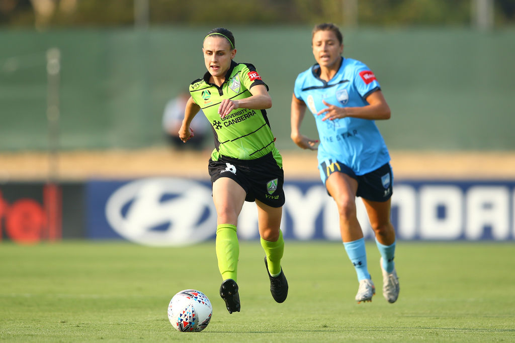 Olivia Price leads United on a counter attack. Photo: Getty Images. 
